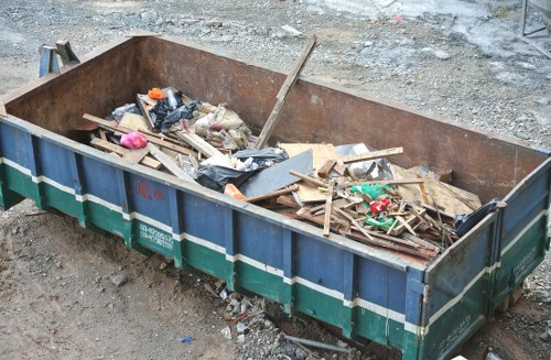 Construction site with builders waste containers in Hammersmith