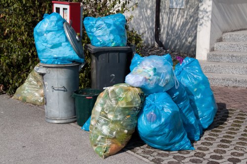 Workers sorting construction waste