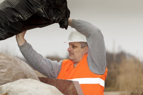 Professional demolition waste removal service in action